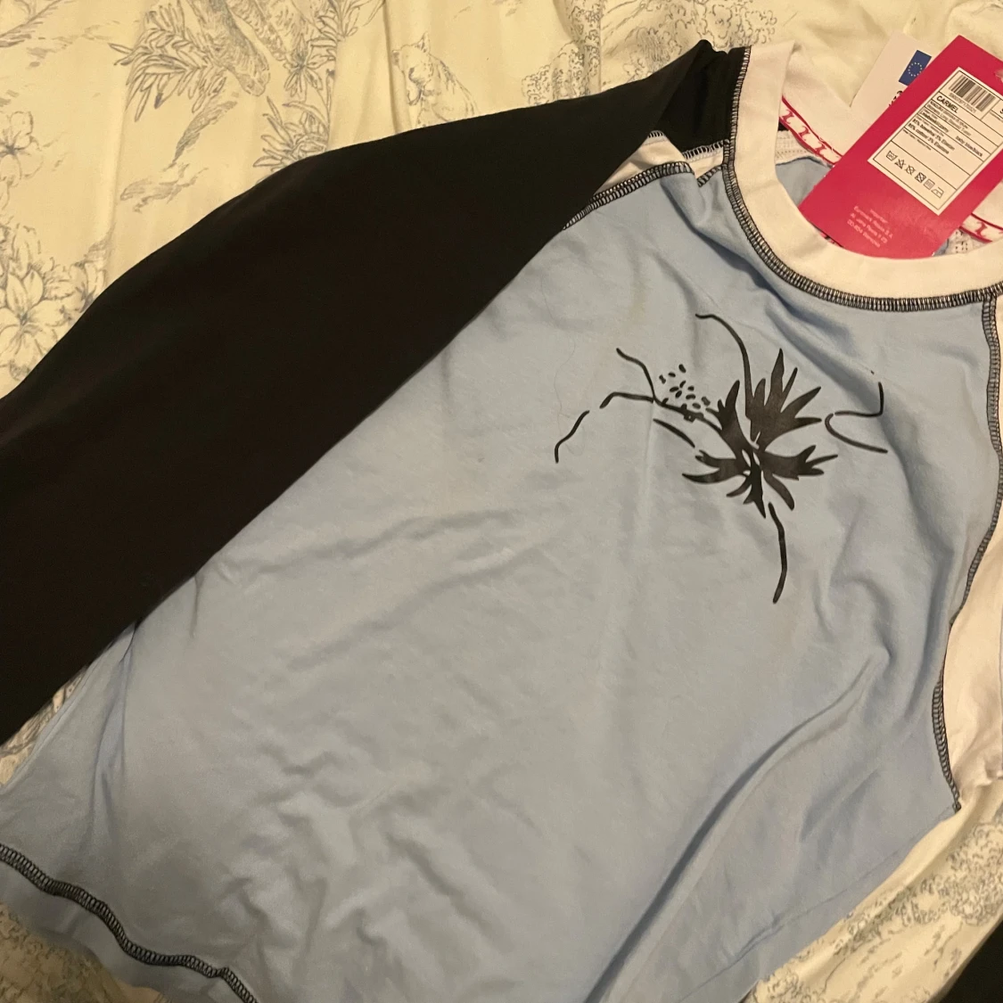 Blå och svart långärmad topp Stir Crazy