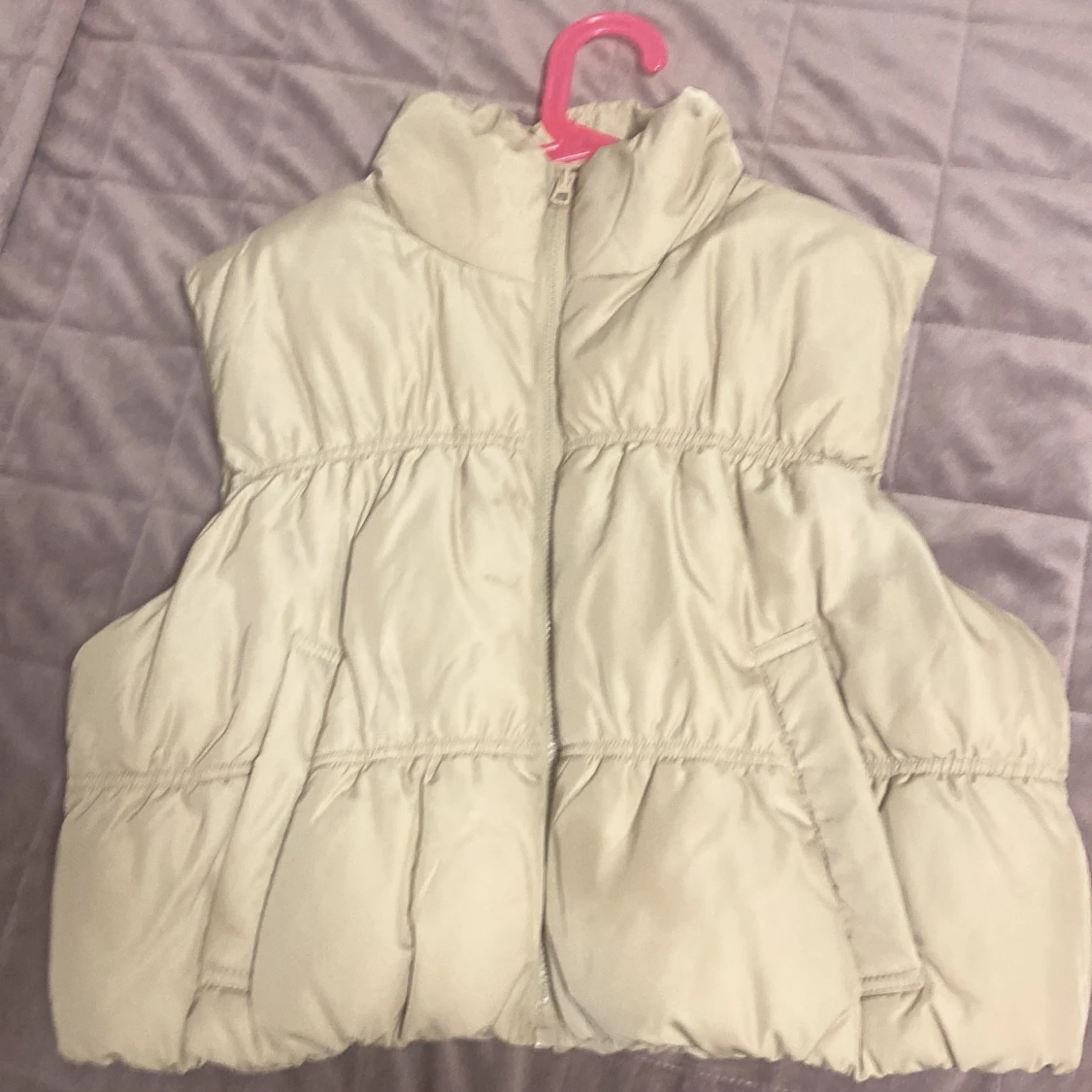 Beige dunväst från H&M Divided