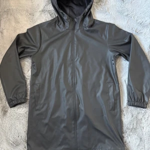  Regnjacka från Selected Homme - Helt ny, har inte använts. 