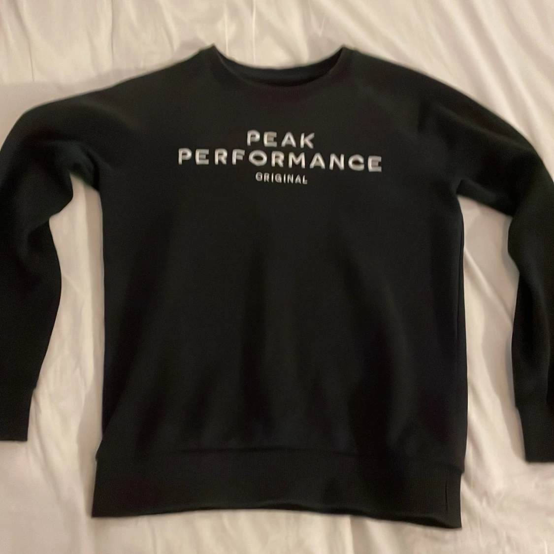 Svart sweatshirt från Peak Performance
