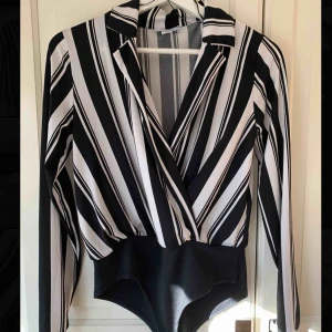  - Oanvänd omlottskjorta!