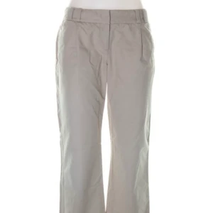 Beiga kostym byxor - Beiga ”vida” kostymbyxor med låg midja från tommy hilfiger. Aldrig använda