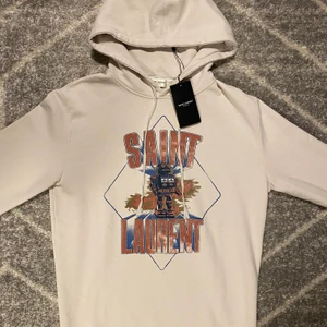 Saint Laurent Robot Hoodie Size S - Saint Laurent Robot Hoodie  Cond: 10/10 helt ny med tags. Köpt från haiendo men aldrig kommit till användning