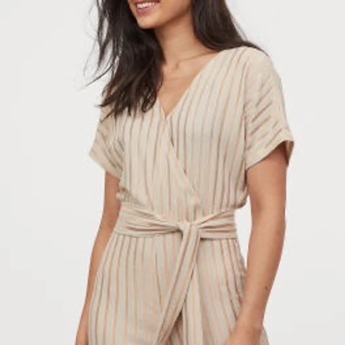 Creppad beige jumpsuit - 90