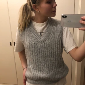 Stickad väst  - Nyskick 