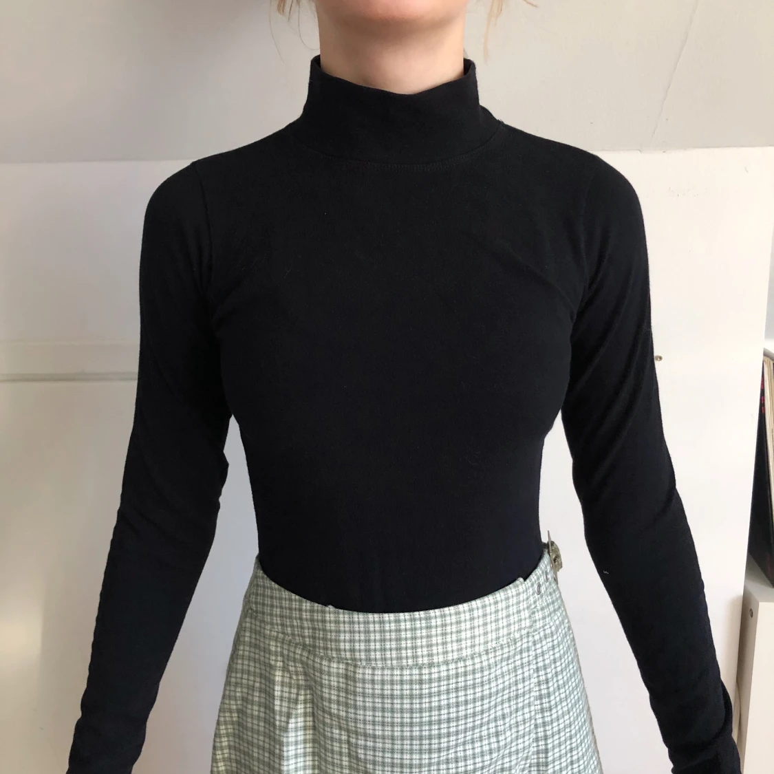 Svart polotröja i body