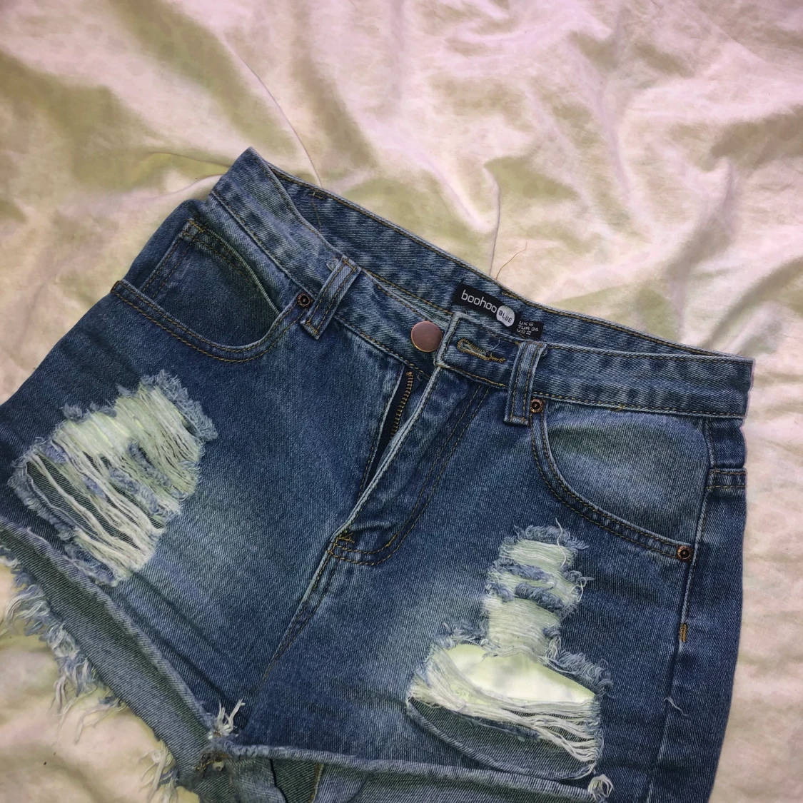 Jeansshorts i strl 34