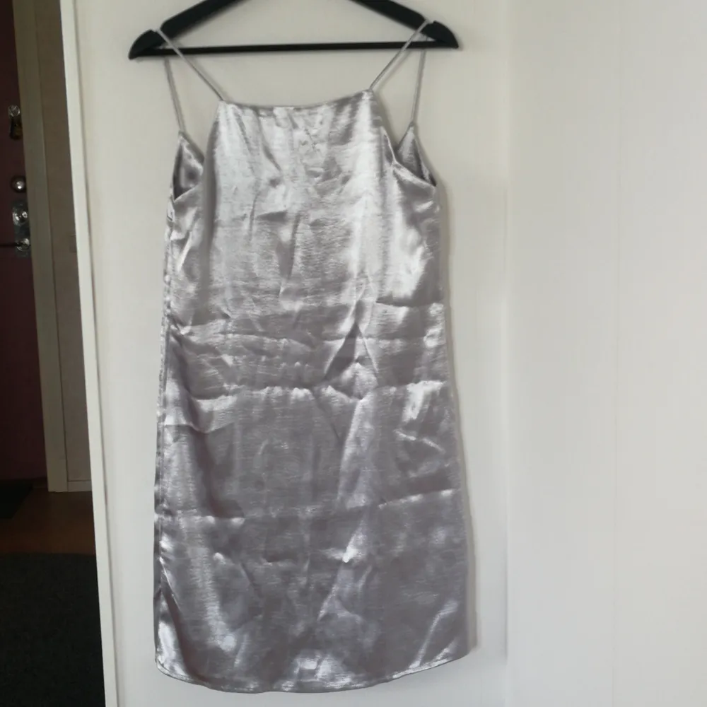 Never worn satın dress Small size 85cm. Mekot.