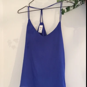  - Fint blått linne köpt i Australien. Använt endast en gång, som nytt! 