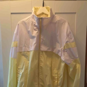  - 90’s Windbreaker. 