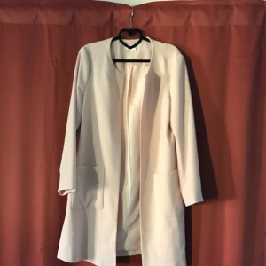  - Superfin tunn kappa i ljust rosa. Som ny! Du betalar frakten. 