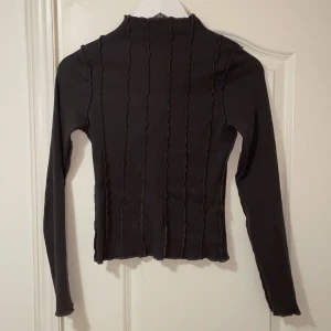 Topp  - Topp från Nelly helt ny storlek xs