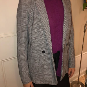 Kavaj - En lite oversize rutig kavaj. 