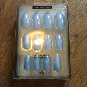  - Ansiktsmask naglar 24 pack och borste 