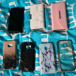  - Samsung galaxy s7 skal och fodral   Skalen säljs för 50kr/styck   Fodralen det med marmor och det rosa säljs för 100/styck. 